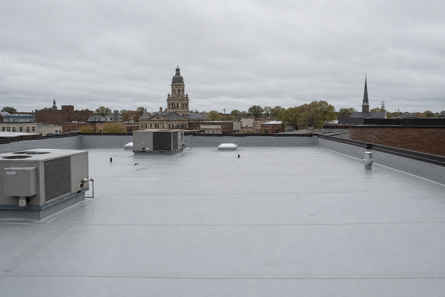 Commercial flat roof with new single-ply membrane